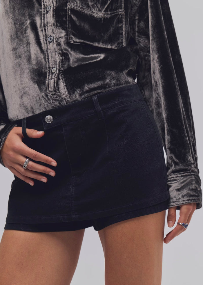 FREE PEOPLE GALLIVANTING VEGAN SUEDE PEEKABOO SKORT - BLACK