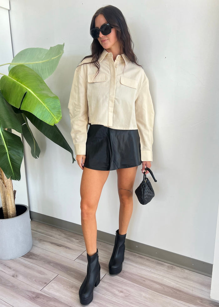 FREE PEOPLE PARADISE FOUND VEGAN SKORT - BLACK