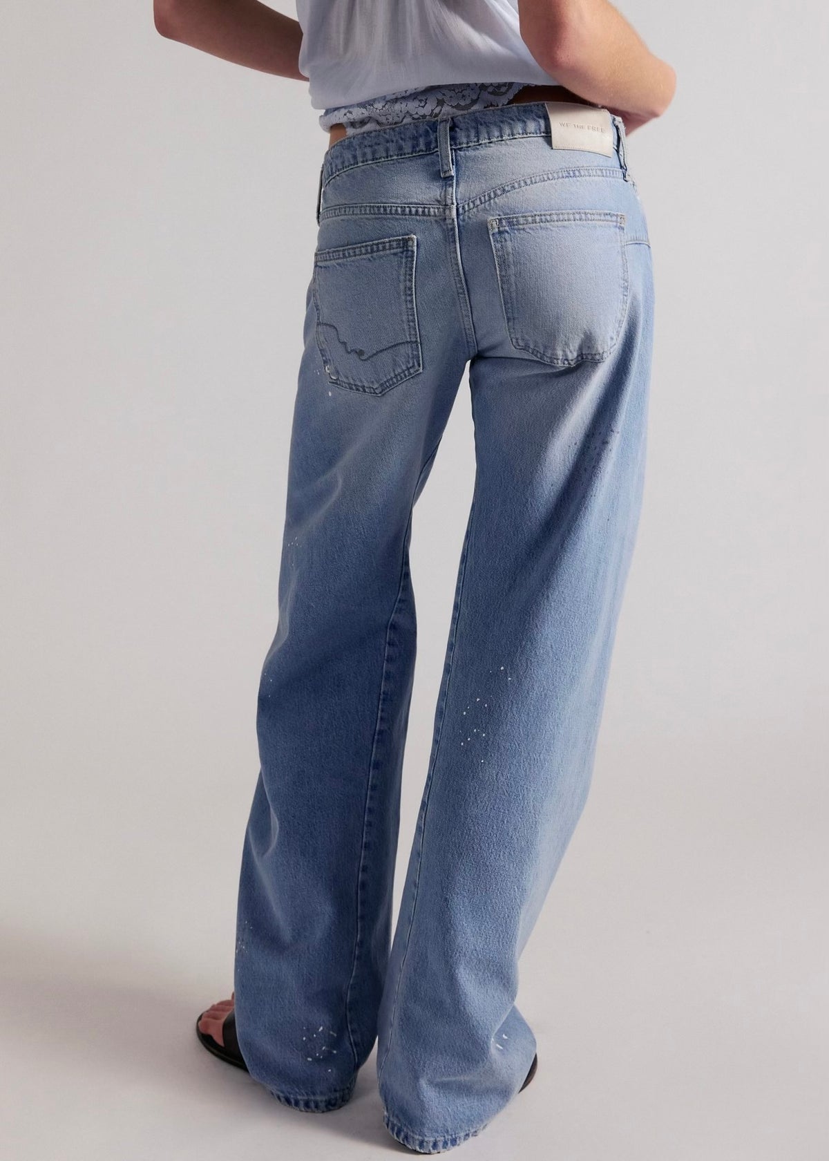 FREE PEOPLE FABLE LOW-RISE TWISTED BOWED JEANS