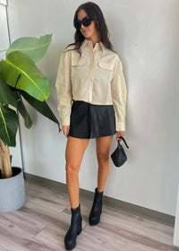 FREE PEOPLE PARADISE FOUND VEGAN SKORT - BLACK